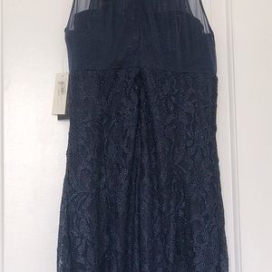 New navy blue, brand Nightwat, polyester and expanded elastan.Never used